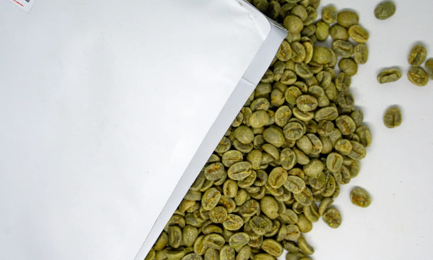 Bag of unroasted beans used in green coffee inventory management for a commercial roastery
